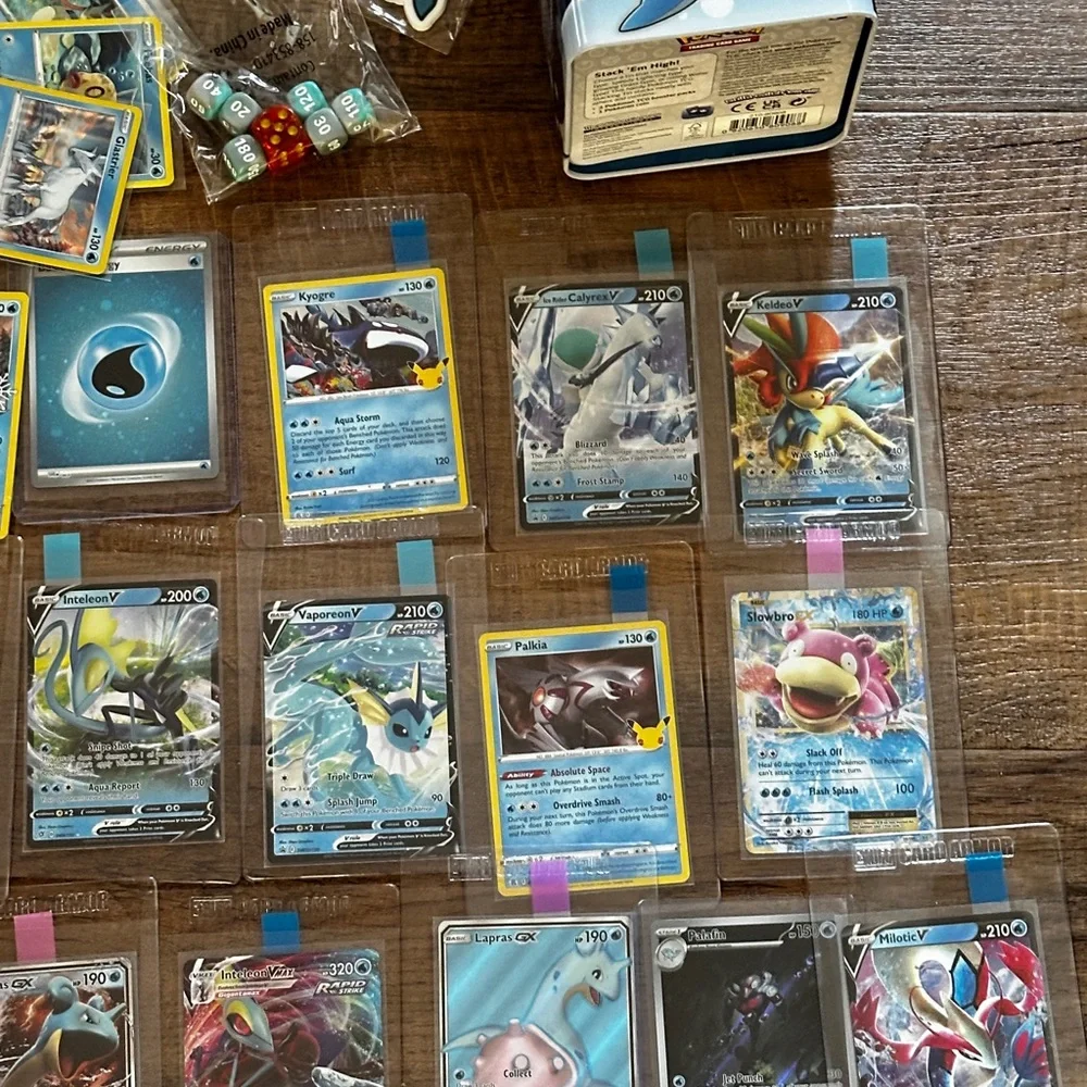 Pokemon Card Collection with Tins and Accessories 25 card Mystery Tin plus bonus